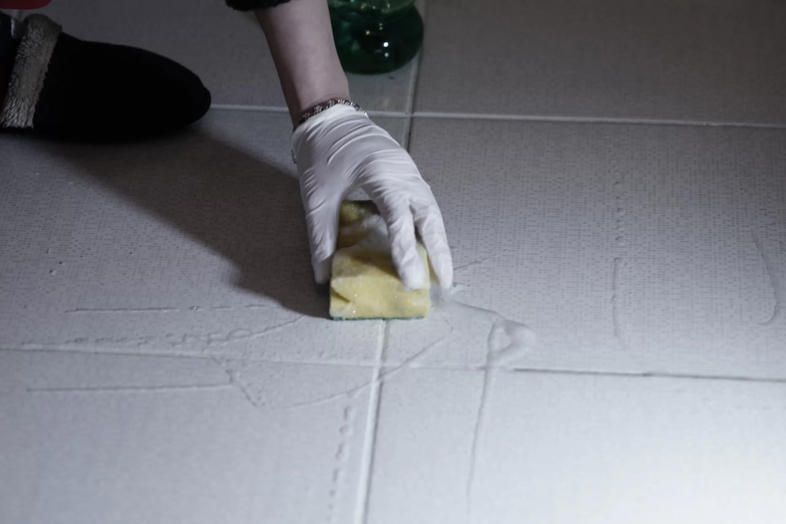 Tile & Grout Cleaning by Angelos Hard Floor & Duct Cleaning - kitchen island tile area clean